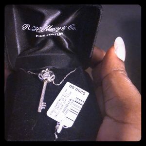 Sterling silver and diamond key necklace